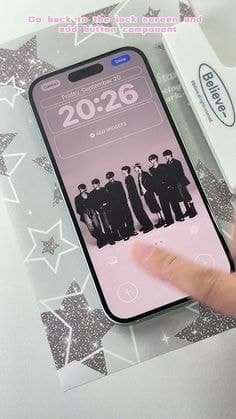 Customized iPhone lock screen appearance showing personalized theme affecting screen color perception.