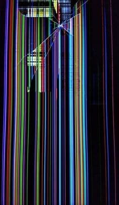 Damaged iPhone screen displaying rainbow lines and brightness failure