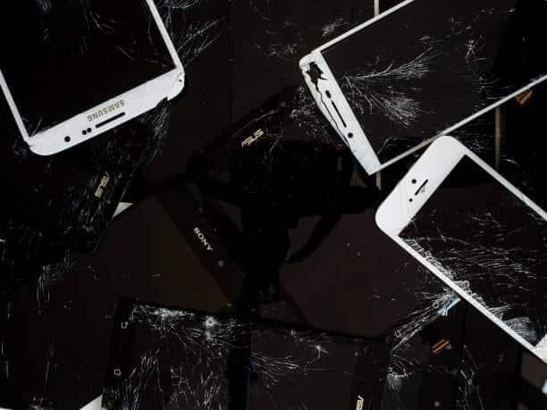 Multiple cracked Samsung and Android phones with black or unresponsive screens